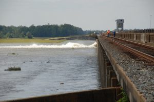 U.S. Army Engineers open the Morganza Spillway , Morganza, MS, to relieve pressure on the flood waters of the Mississippi River, on Saturday, May 15, 2011. Source: flickr/US Army Corp of Engineers Photo.