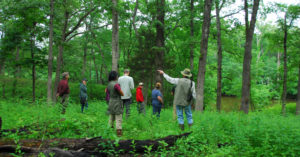 Photo of Marty Kemper leading a monitoring training with IDNR staff